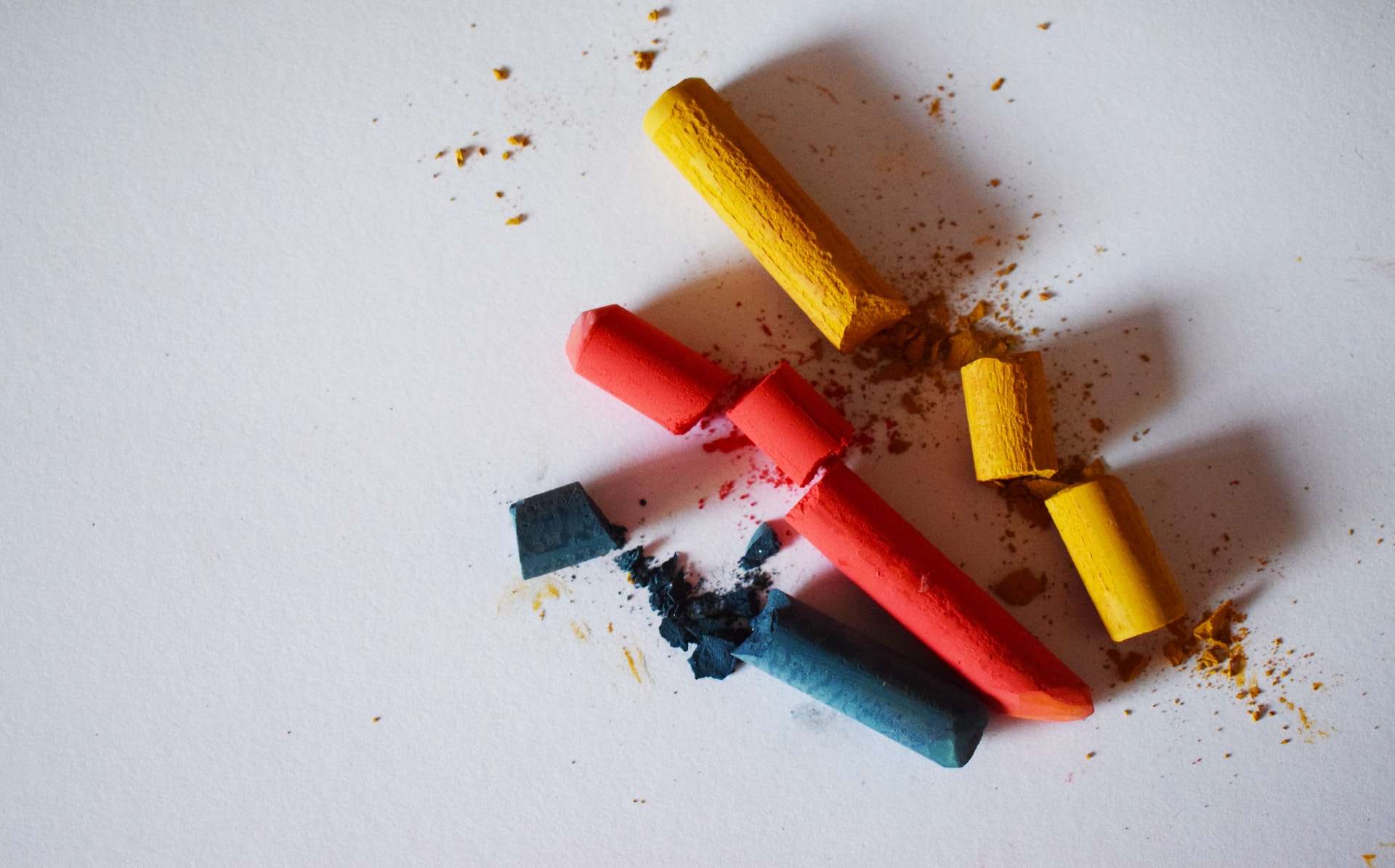 colored chalk on a white table